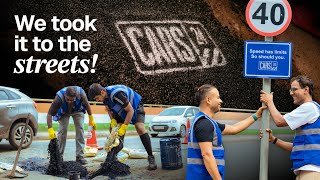 Cars24 team filling potholes and installing road signs
